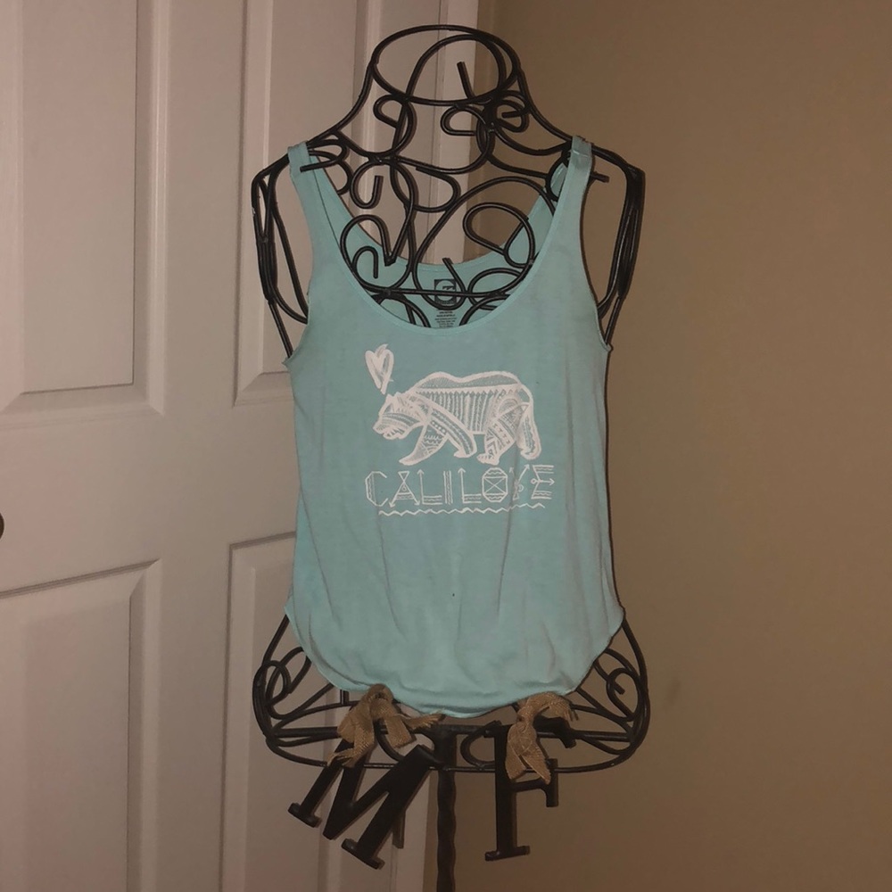 Turquoise tank top.